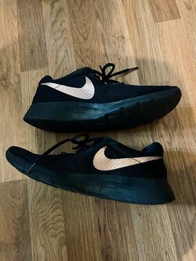 Nike Black Sneakers with Metallic Rose Gold Swoosh